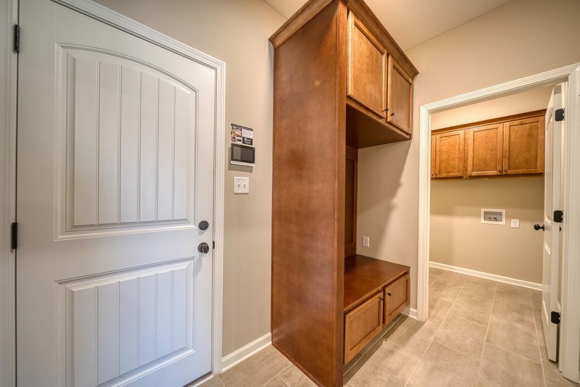 159 Como Lane Atoka, TN 38004 - Photo 15 of 38 a view of kitchen cabinets and refrigerator