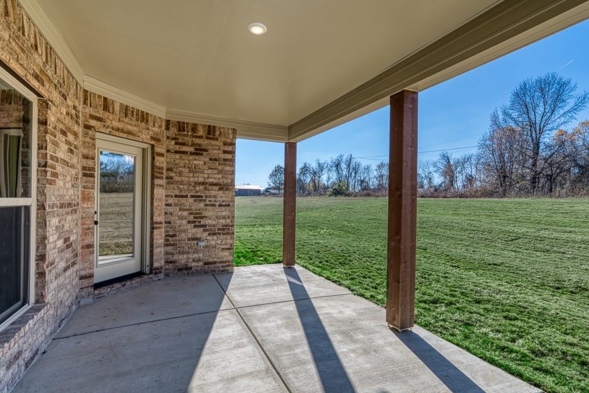 159 Como Lane Atoka, TN 38004 - Photo 28 of 38 a porch with a table and chairs