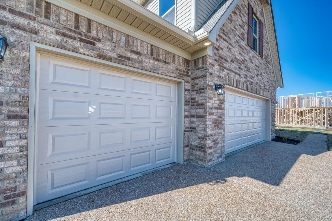 159 Como Lane Atoka, TN 38004 - Photo 29 of 38 a view of a brick house with large windows