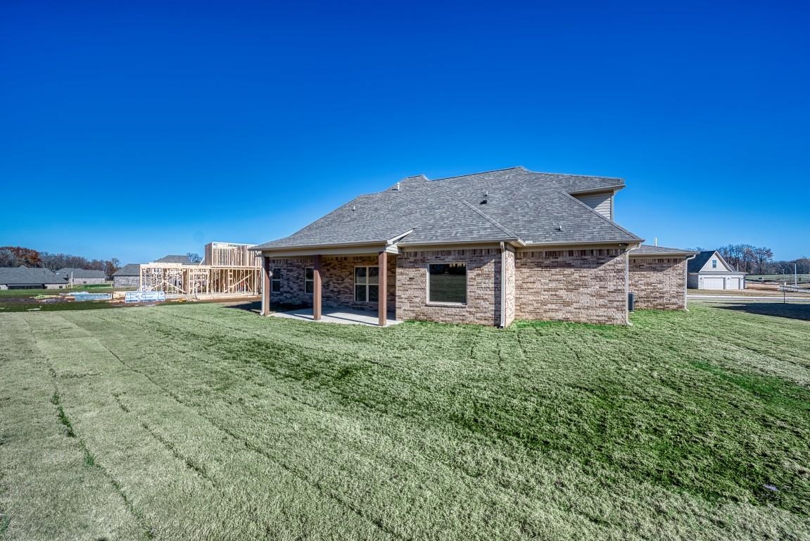 159 Como Lane Atoka, TN 38004 - Photo 35 of 38 a view of a house with a backyard