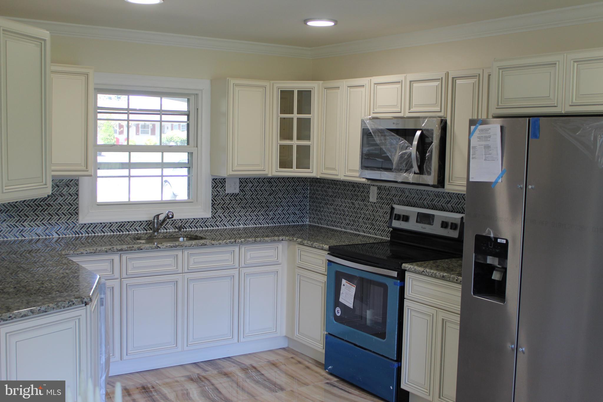 132 Country Club Road Willingboro, NJ 08046 - Photo 13 of 47 Kitchen with brand new stainless steel appliances