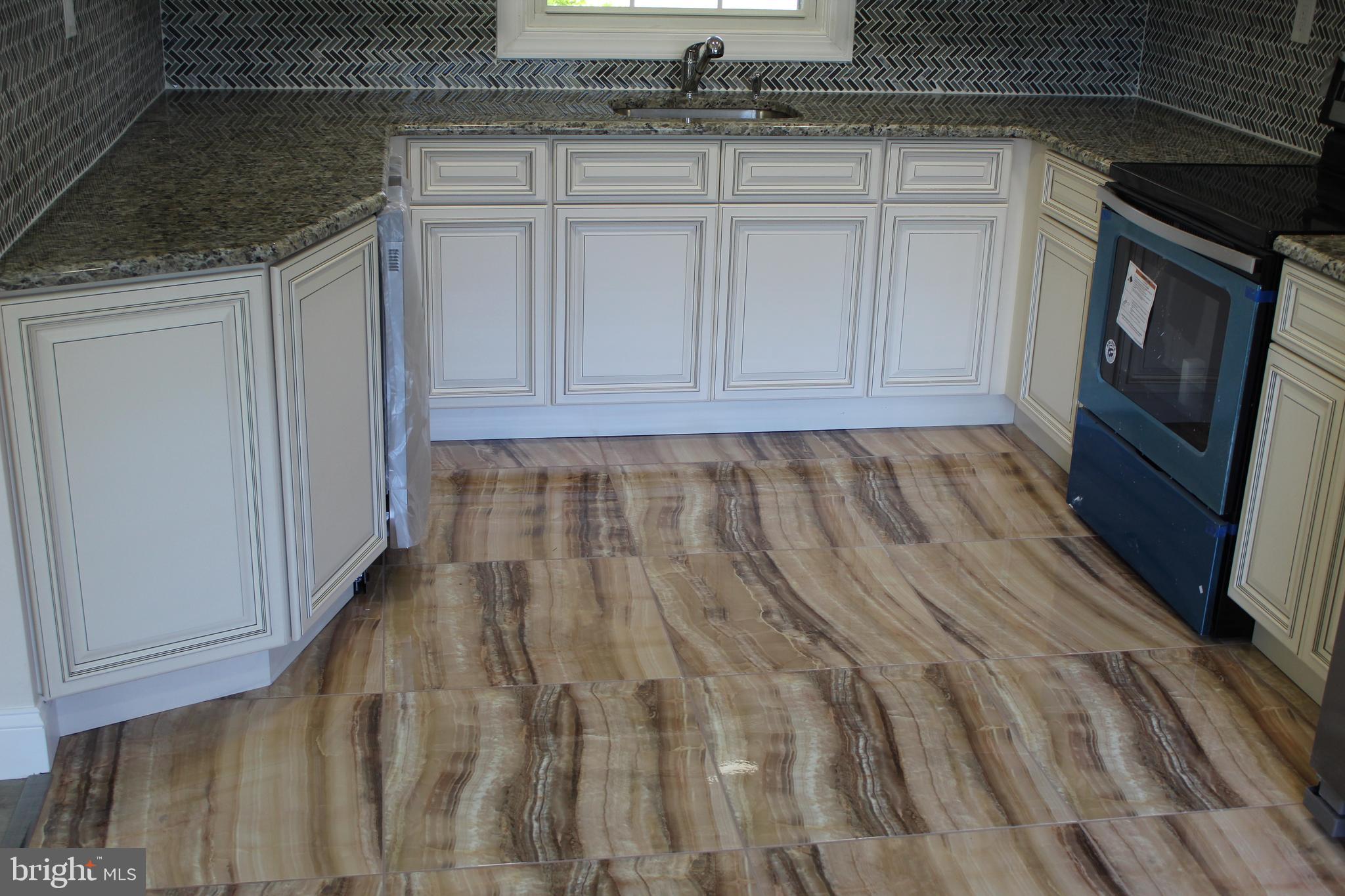 132 Country Club Road Willingboro, NJ 08046 - Photo 30 of 47 Elegant tiles on Kitchen floor