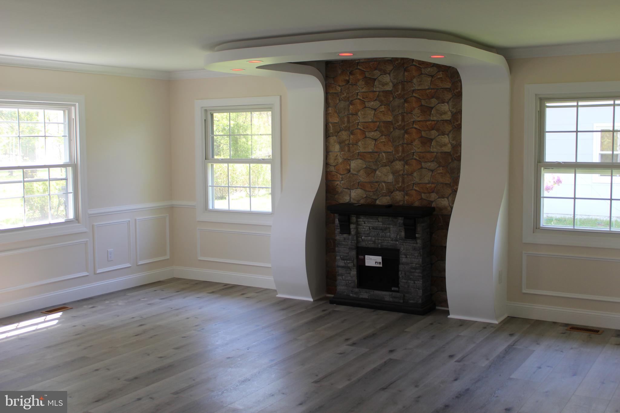 132 Country Club Road Willingboro, NJ 08046 - Photo 8 of 47 Decorated Arch around Fireplace