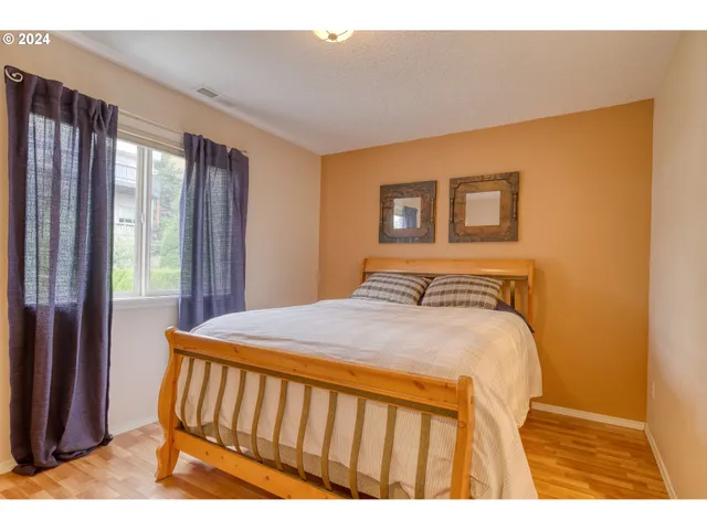 a bedroom with a bed and a closet