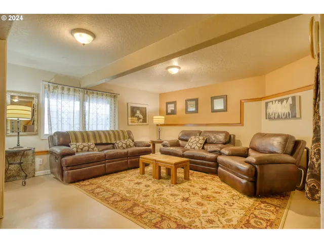 a kitchen with cabinets a sink and appliances