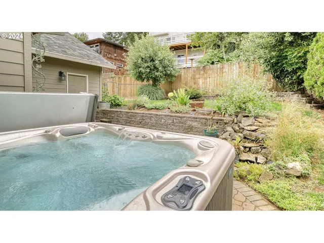 a view of a back yard of the house