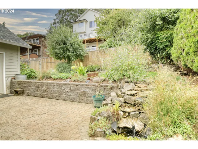 a view of a backyard of the house