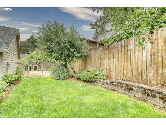 a view of balcony with wooden floor