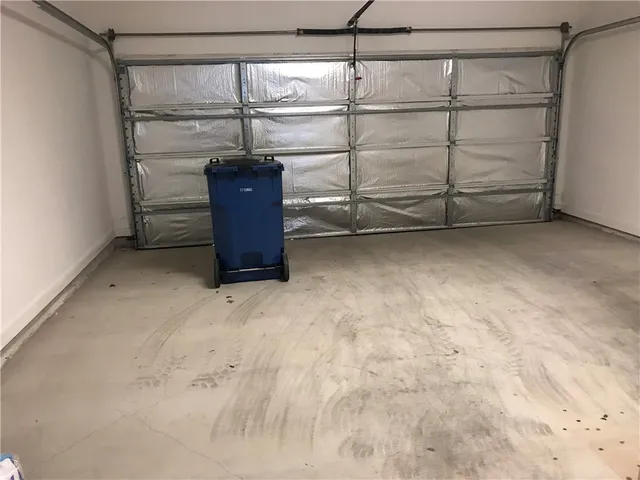 a bedroom with a bed and a fireplace