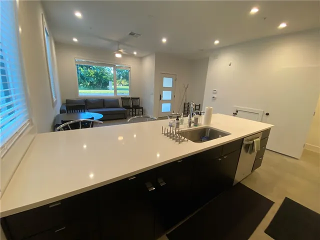 a bathroom with a sink vanity and a mirror