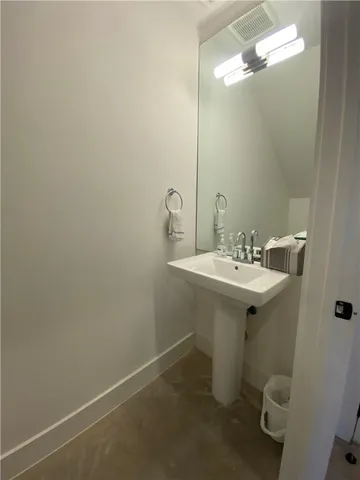 a view of hallway with mirror