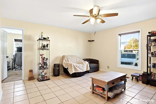 a bedroom with furniture and window