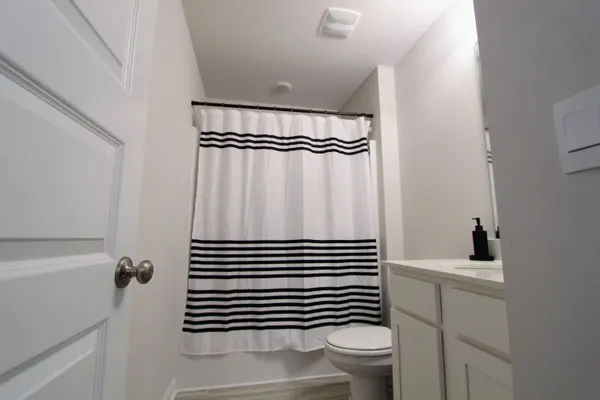 a bathroom with a sink and a toilet