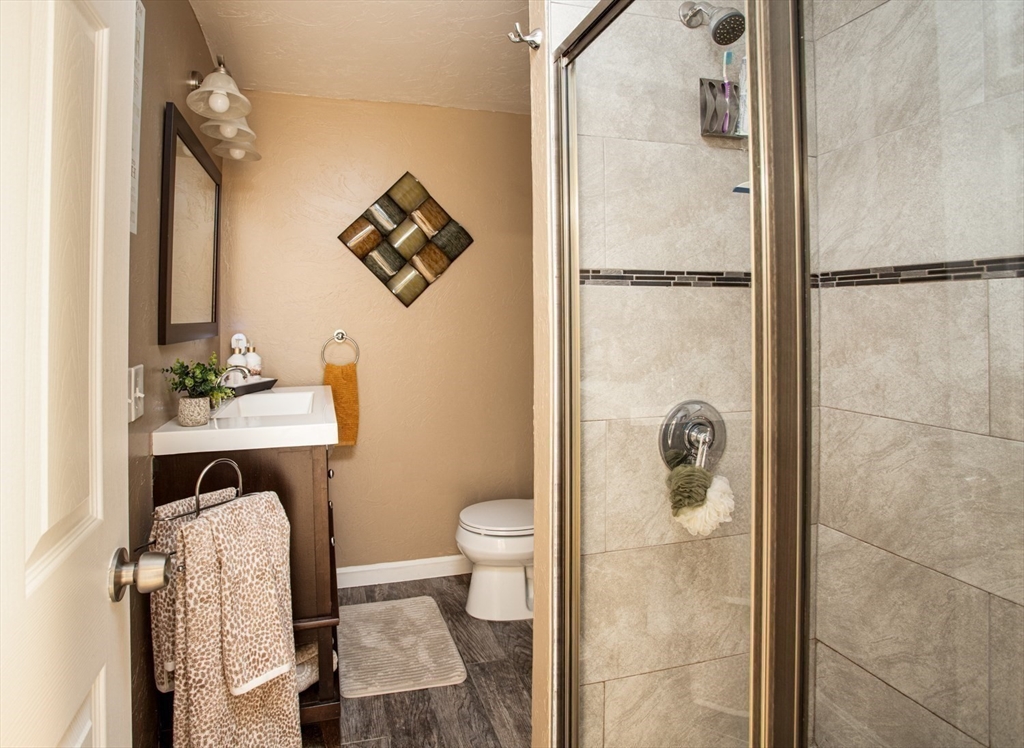 357 Baker Street Fall River, MA 02721 - Photo 22 of 31 a bathroom with a sink toilet and shower