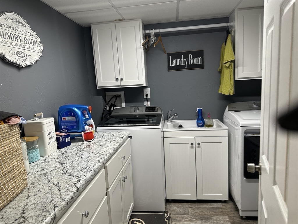 357 Baker Street Fall River, MA 02721 - Photo 23 of 31 a utility room with sink dryer and washer