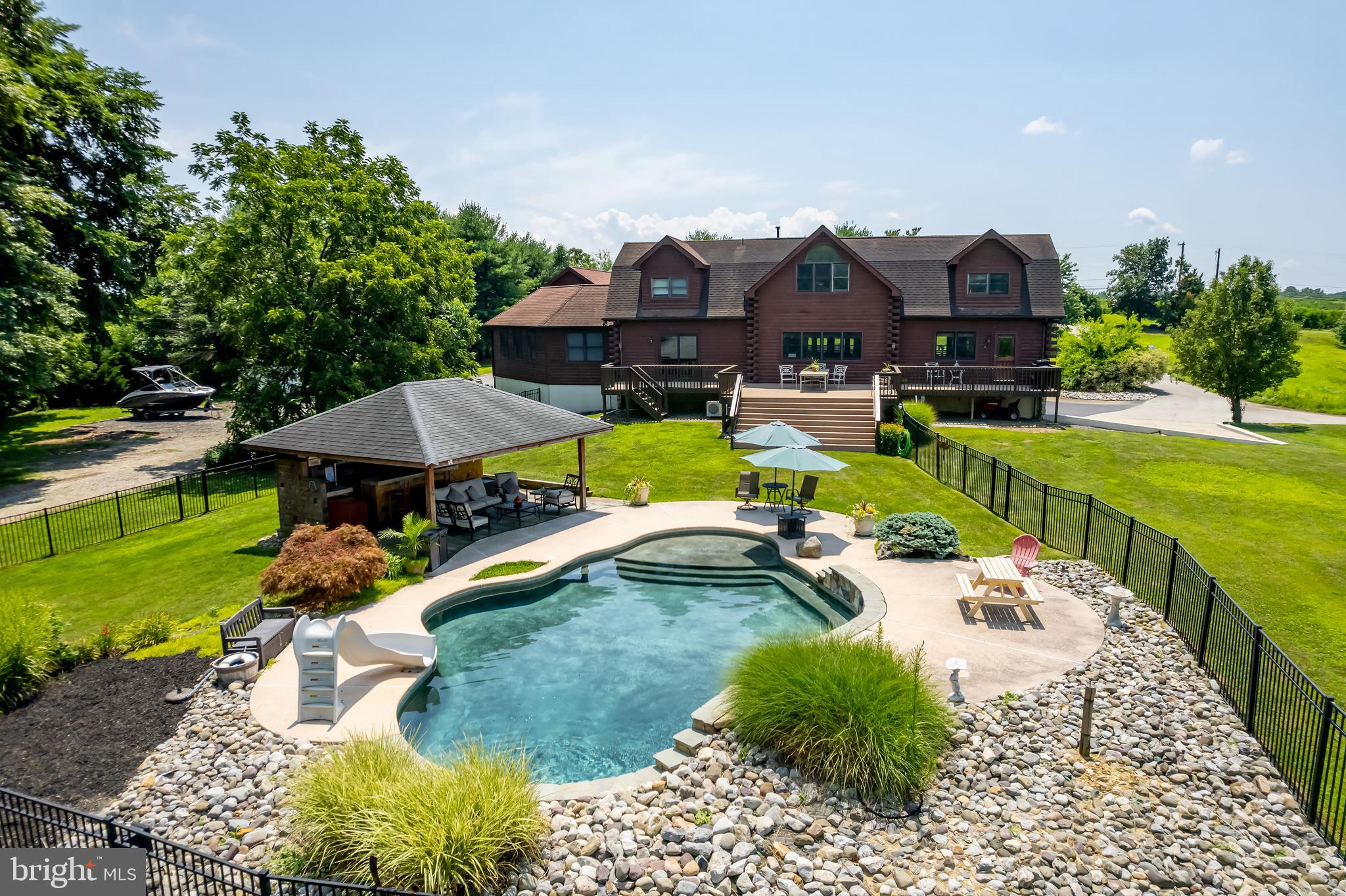 170 Heilig Road Sewell, NJ 08080 - Photo 12 of 54 a view of a house with a yard and patio
