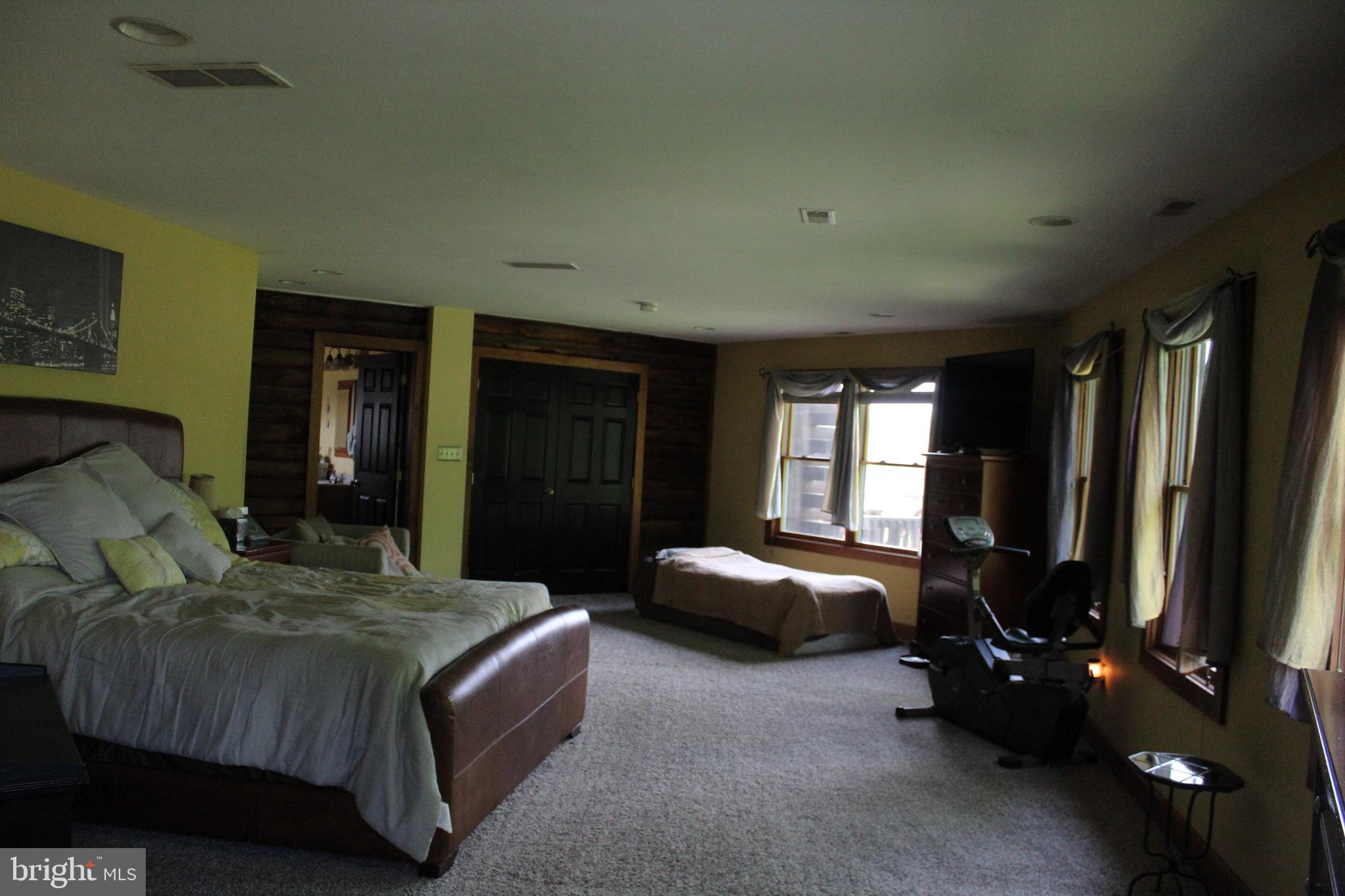 170 Heilig Road Sewell, NJ 08080 - Photo 29 of 54 a bedroom with a bed window and a television