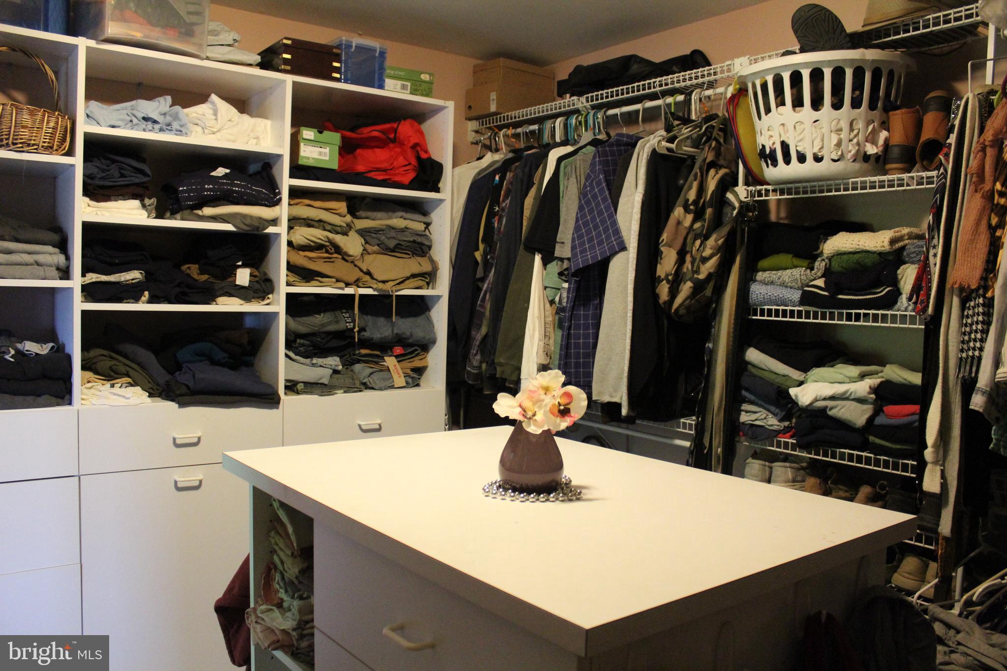170 Heilig Road Sewell, NJ 08080 - Photo 30 of 54 a view of walk in closet with clothes and shoes