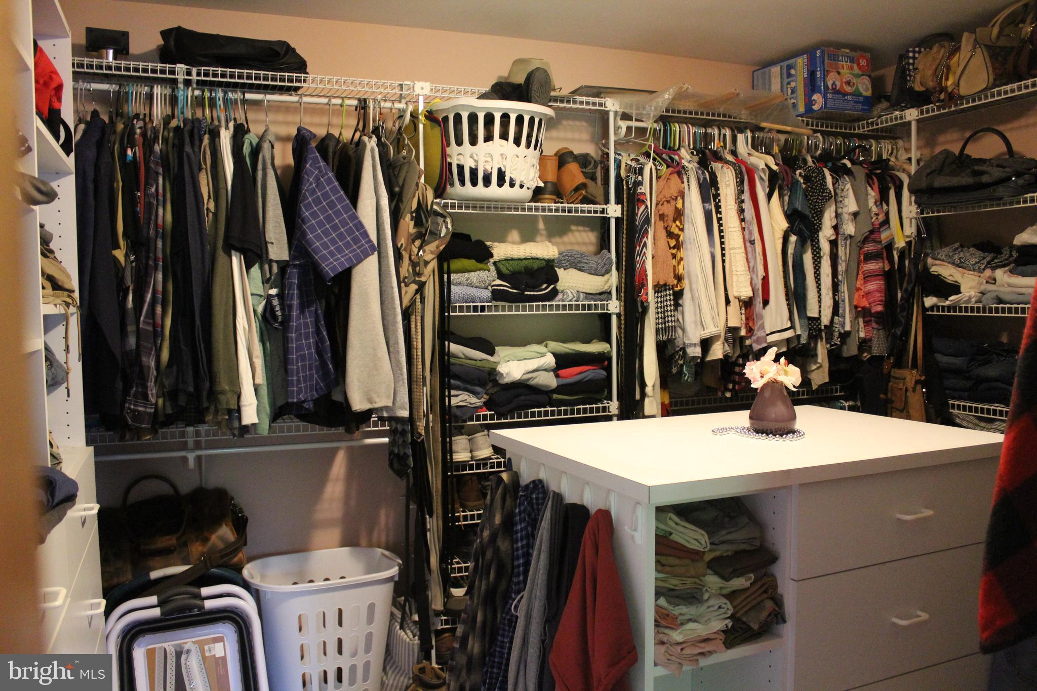 170 Heilig Road Sewell, NJ 08080 - Photo 31 of 54 a view of walk in closet with clothes and shoes