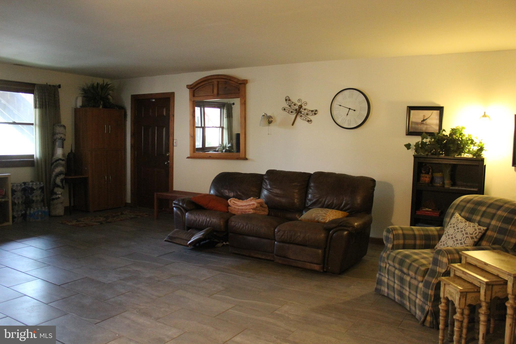 170 Heilig Road Sewell, NJ 08080 - Photo 35 of 54 a living room with furniture and a window