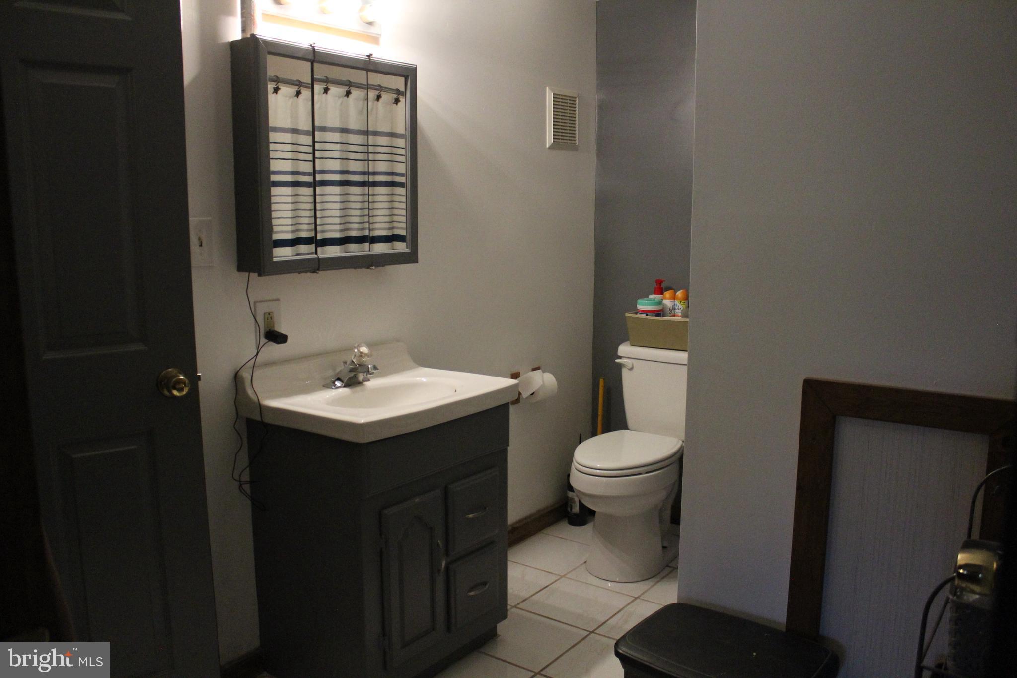 170 Heilig Road Sewell, NJ 08080 - Photo 40 of 54 a bathroom with a sink toilet and mirror