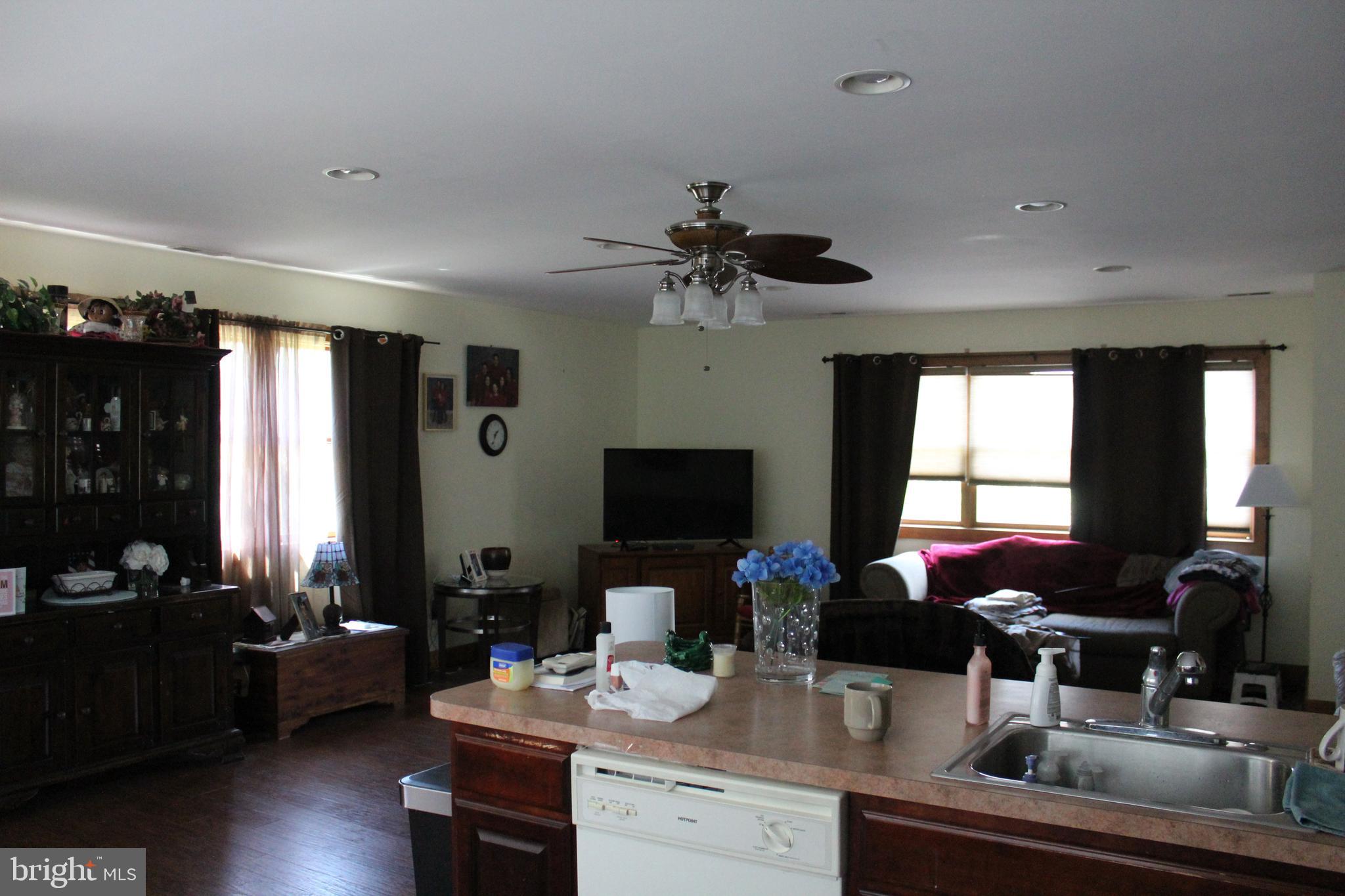 170 Heilig Road Sewell, NJ 08080 - Photo 52 of 54 a living room with furniture and a flat screen tv