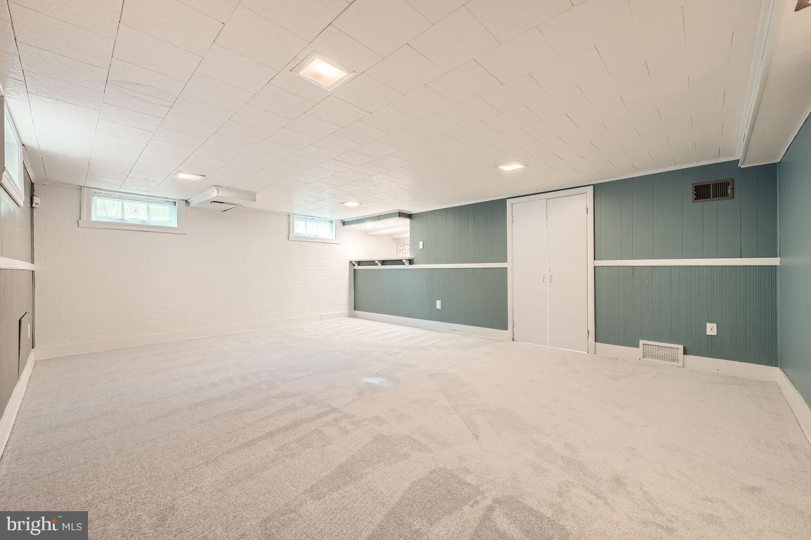 1833 Deveron Road Towson, MD 21286 - Photo 32 of 46 Fresh paint, recessed lights, and carpet.