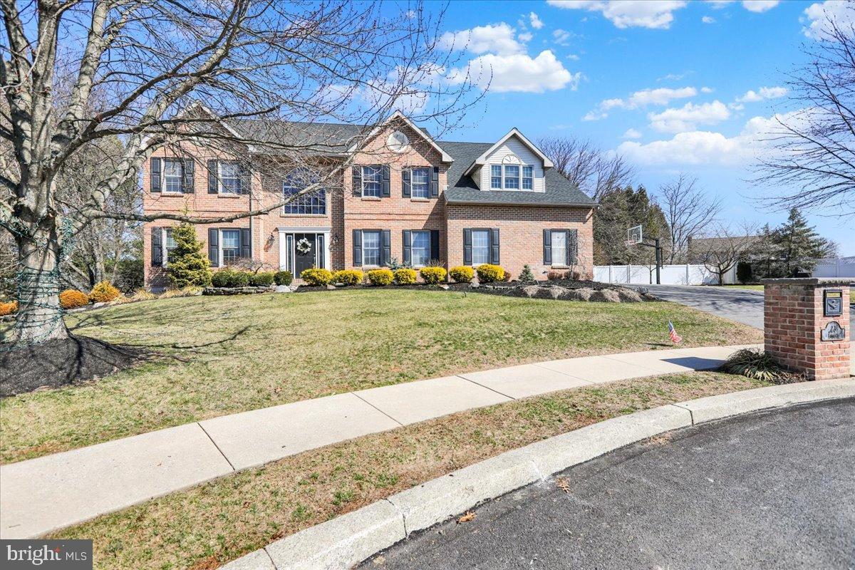 23 Laura Court Sinking Spring, PA 19608 - Photo 1 of 67 a front view of a house with a yard