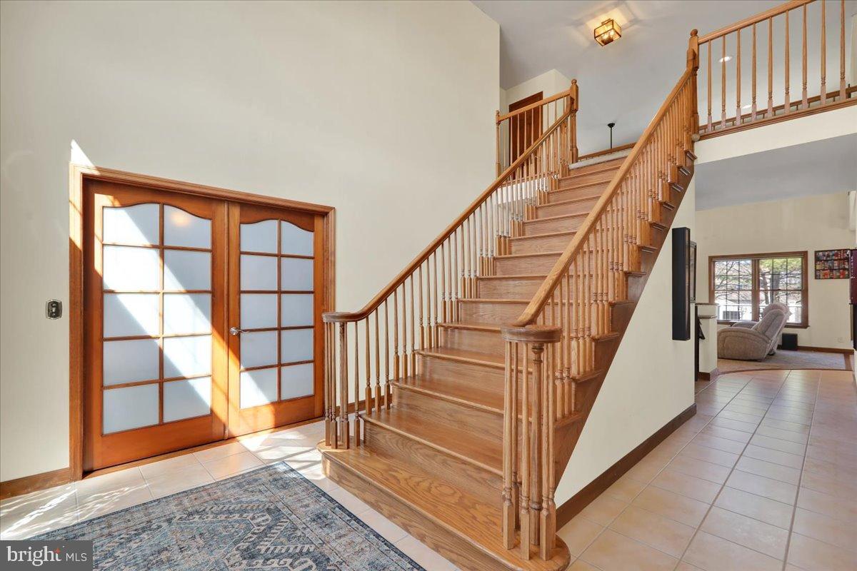 23 Laura Court Sinking Spring, PA 19608 - Photo 2 of 67 Inviting foyer with elegant staircase.