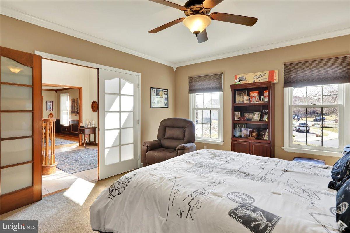 23 Laura Court Sinking Spring, PA 19608 - Photo 21 of 67 a bedroom with a large bed and a large window