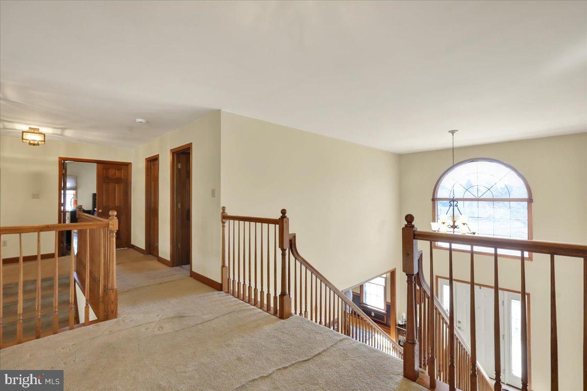 23 Laura Court Sinking Spring, PA 19608 - Photo 26 of 67 Spacious landing with elegant staircase.