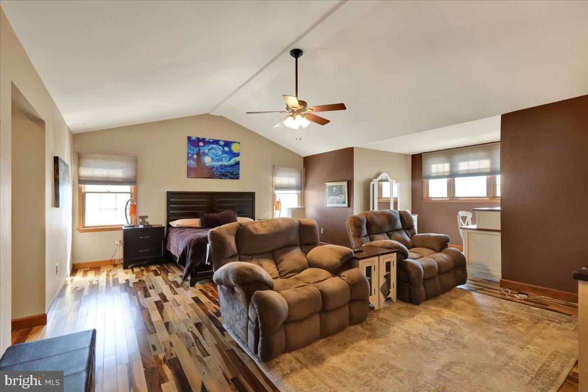 23 Laura Court Sinking Spring, PA 19608 - Photo 29 of 67 a living room with furniture a fireplace and a window