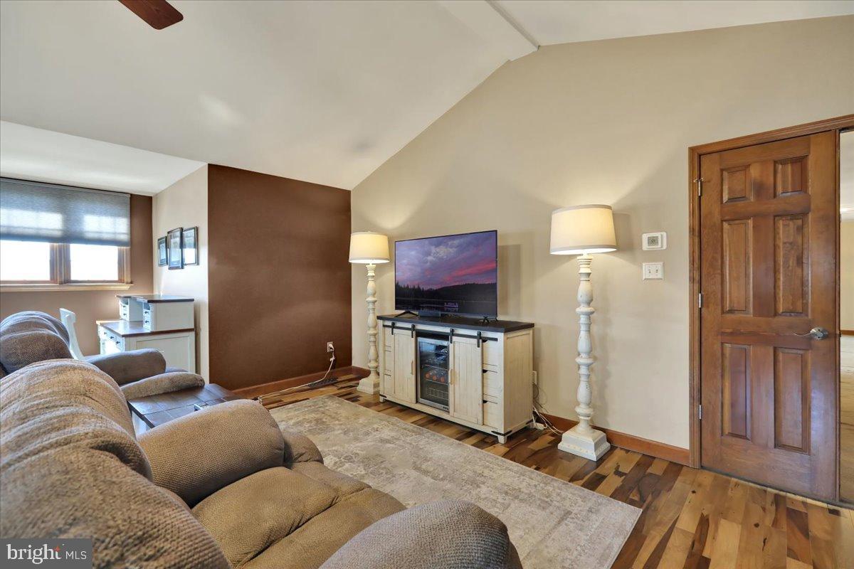 23 Laura Court Sinking Spring, PA 19608 - Photo 30 of 67 a living room with furniture and a flat screen tv