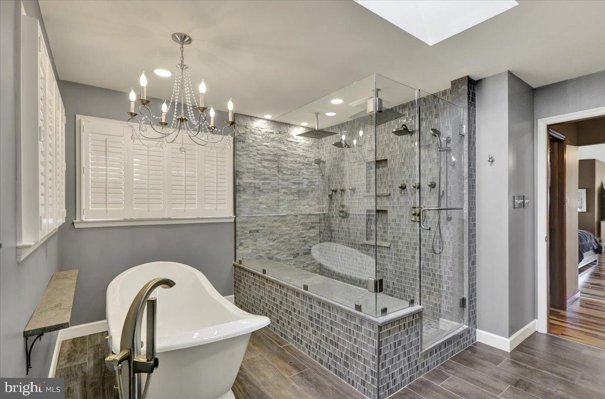 23 Laura Court Sinking Spring, PA 19608 - Photo 37 of 67 a bathroom with a granite countertop sink a toilet a mirror and shower