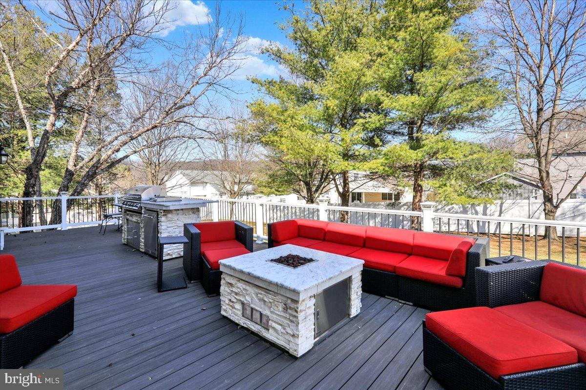 23 Laura Court Sinking Spring, PA 19608 - Photo 55 of 67 a sitting area with furniture and wooden floor