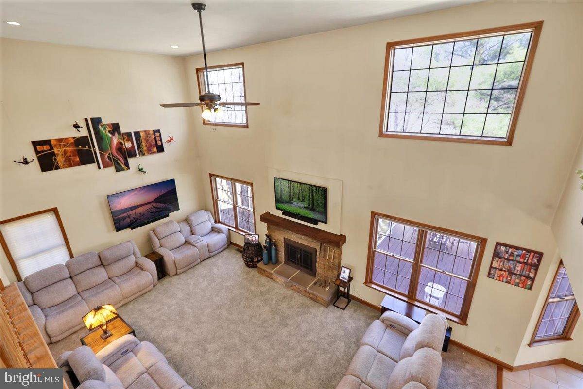 23 Laura Court Sinking Spring, PA 19608 - Photo 6 of 67 a living room with furniture and a flat screen tv