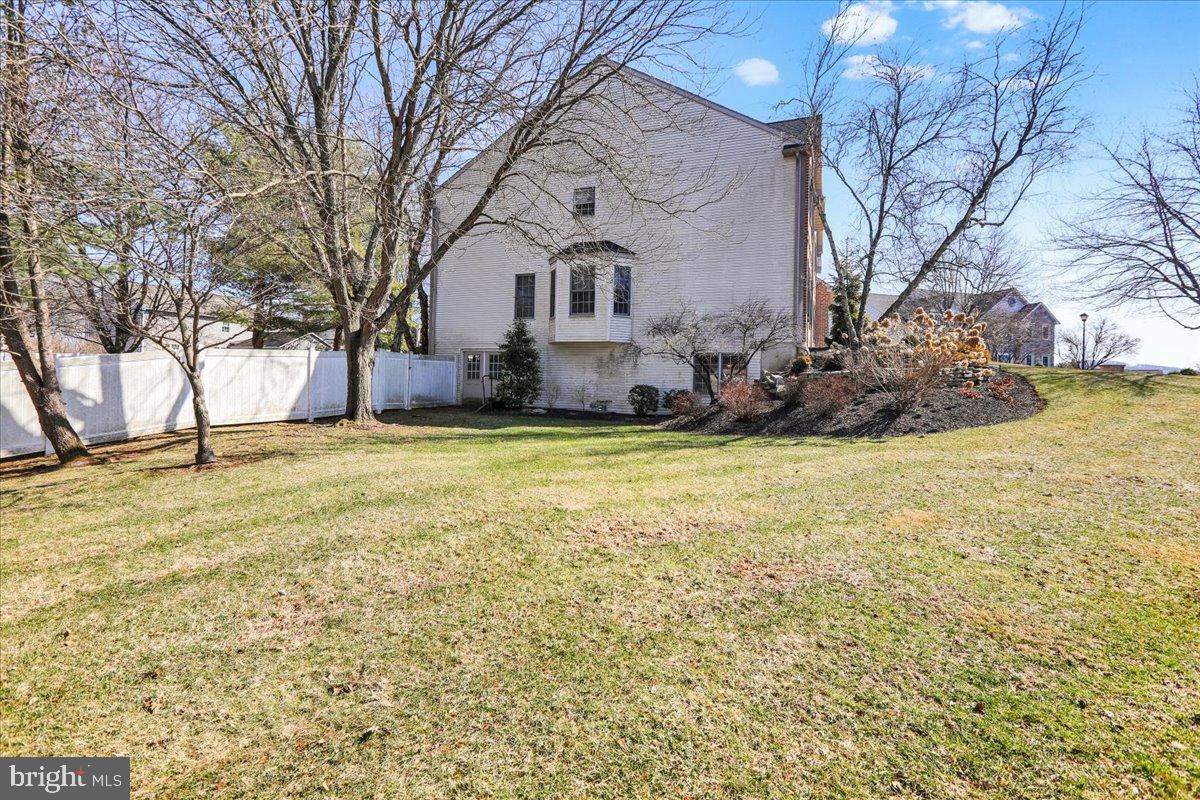 23 Laura Court Sinking Spring, PA 19608 - Photo 62 of 67 Spacious backyard with serene landscaping.