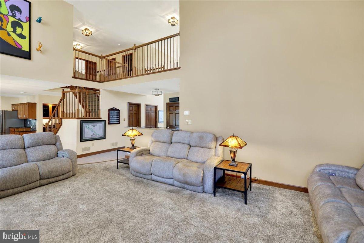 23 Laura Court Sinking Spring, PA 19608 - Photo 7 of 67 a living room with furniture and a couch