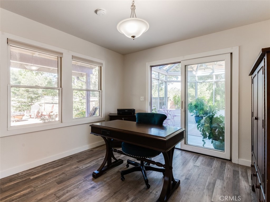 8370 Prado Lane Atascadero, CA 93422 - Photo 11 of 54 a workspace with wooden floor and a window