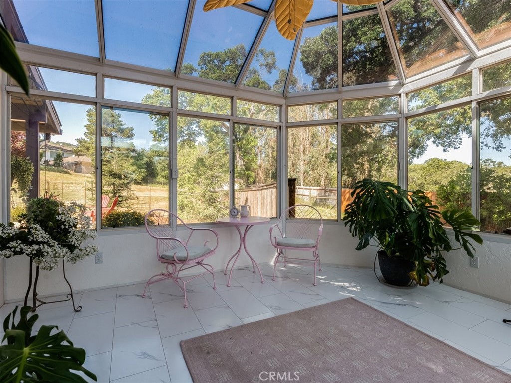 8370 Prado Lane Atascadero, CA 93422 - Photo 12 of 54 a living room with furniture and potted plants