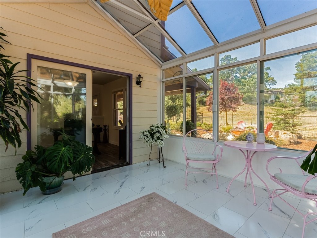 8370 Prado Lane Atascadero, CA 93422 - Photo 13 of 54 a lobby with furniture and large windows