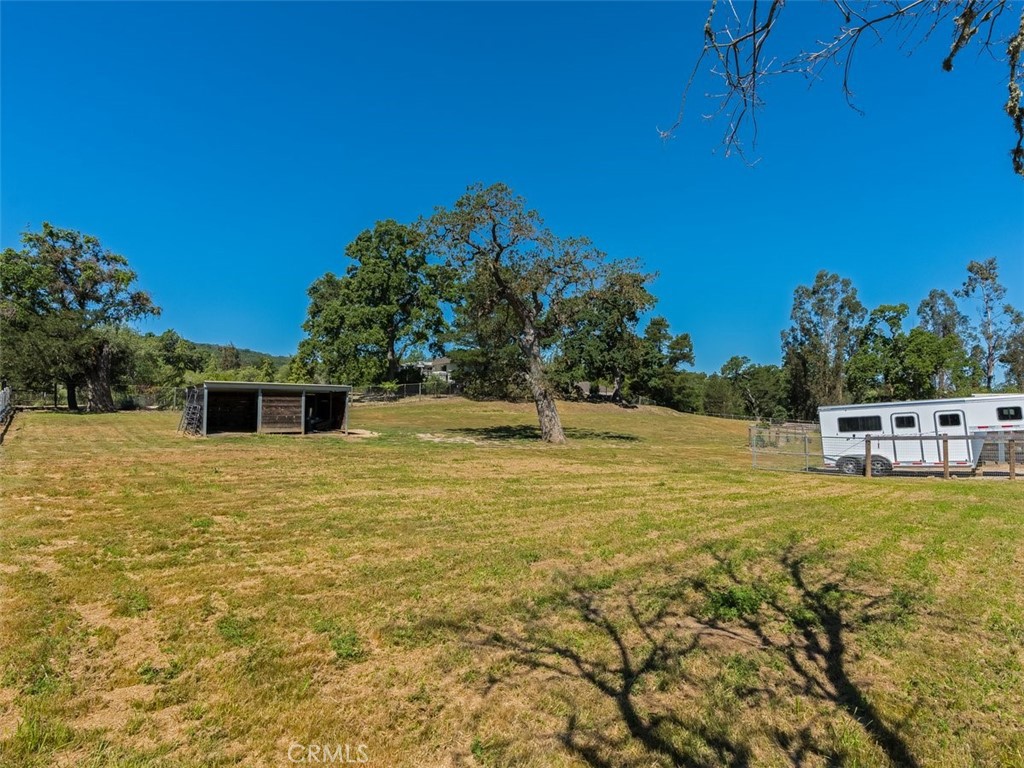 8370 Prado Lane Atascadero, CA 93422 - Photo 48 of 54 a view of a swimming pool with an outdoor seating and a yard
