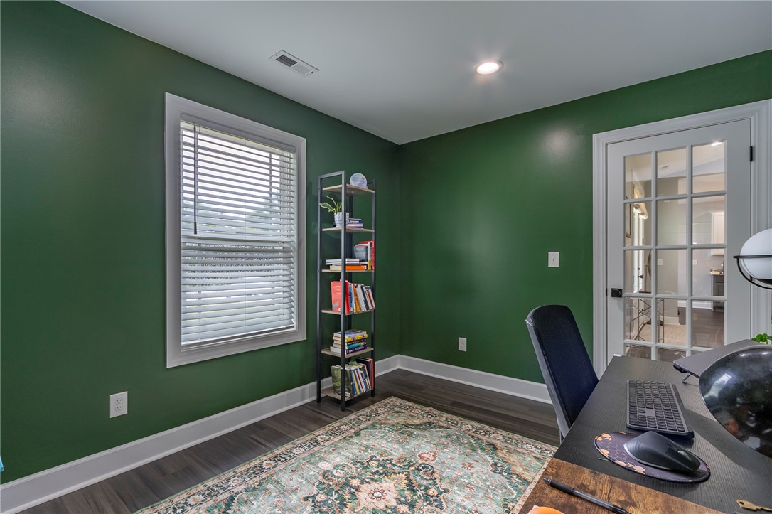 3080 McGee Road Iva, SC 29655 - Photo 17 of 49 A well-appointed study with recessed lighting and a french door, creating an inviting workspace.