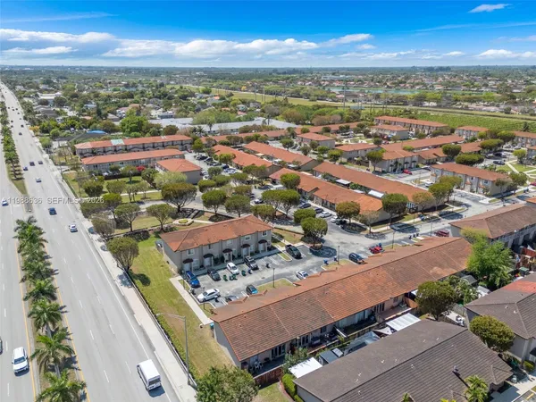 an aerial view of residential building with outdoor space