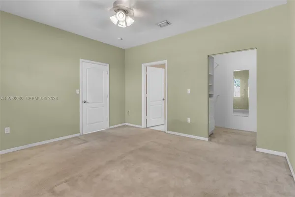 an empty room with a bathroom