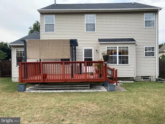 a view of a house with a roof deck