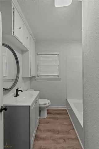 a bathroom with a sink and a toilet