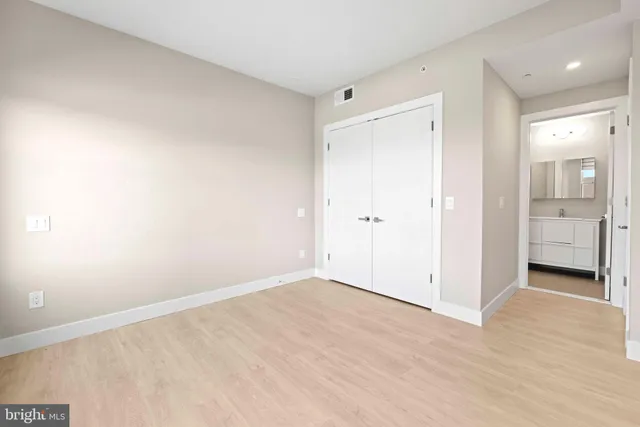 a bathroom with a shower and sink