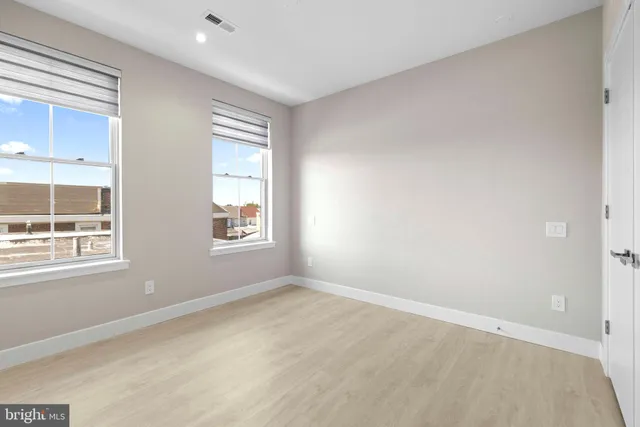 an empty room with windows