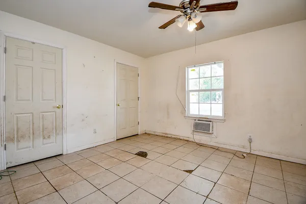a view of an empty room and window